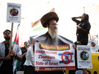 Orthodox jewish people stand demonstrate in support of Palestine in Brooklyn, New York, US, on July 31, 2021.  (