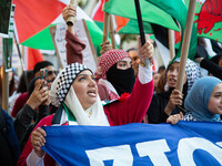 People hold palestinian flags during a demonstrate in support of Palestine in Brooklyn, New York, US on July 31, 2021.  (