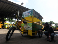 A Worker seen charging an electric bicycle at a Office the Department of Environment in Bogor, West Java, Indonesia, on August 4, 2021. (