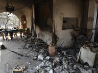 A house is   destroyed  by the wildfire in the northern suburb of Athens Varimpompi, on August 4, 2021. (