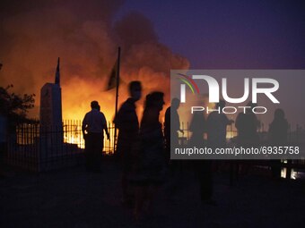 Forest fire in the Kourkouli village, in Evia, Greece, on August 5, 2021.  People were evacuated from their homes after a wildfire reached r...