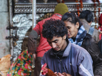 Hindu man sacrifices a rooster to the Goddess Kali at the Dakshinkali Temple in Nepal, on December 13, 2011. Dakshinkali Temple is located a...