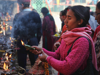 Hindu devotes offer prayers at the Dakshinkali Temple in Nepal, on December 13, 2011. Dakshinkali Temple is located about 22 km from Nepal’s...