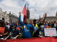 LONDON, UNITED KINGDOM - AUGUST 08, 2021: Members of British Myanmar community and their supporters demonstrate in Parliament Square on the...