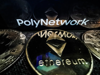 Poly Network logo displayed on a phone screen and representation of Ethereum cryptocurrency is seen in this illustration photo taken in Sulk...