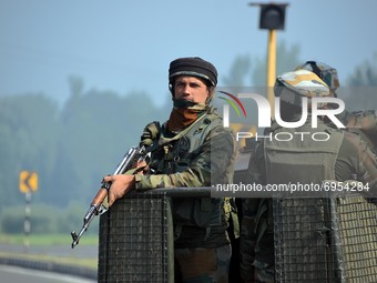 An Indian army vehicle moves near the site of encounter in south Kashmir's Kulgam area, India on August 13, 2021. Inspector General of Polic...