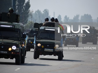 Indian army vehicles move near the site of encounter in south Kashmir's Kulgam area, India on August 13, 2021. Inspector General of Police (...