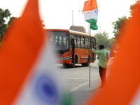 A man sells Indian national flags along a road, ahead of India's 75th Independence day celebrations, in New Delhi, India on August 13, 2021....