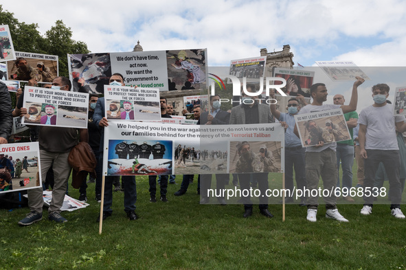 LONDON, UNITED KINGDOM - AUGUST 18, 2021: Members of the Afghan community in Britain including  former interpreters for the British Army in...