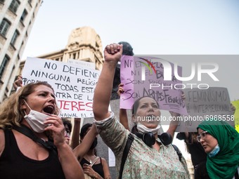 Protesters are seen during demonstration.Around a hundred women have participated in a feminist demonstration in front of the United Nation...