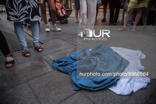 Burkas are seen on the ground.
Around a hundred women have participated in a feminist demonstration in front of the United Nations headquart...