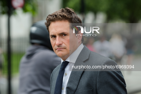LONDON, UNITED KINGDOM - AUGUST 18, 2021: Johnny Mercer MP takes part in a protest for Afghanistan in Parliament Square as MPs hold a debate...