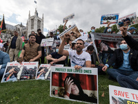 LONDON, UNITED KINGDOM - AUGUST 18, 2021: Demonstrators including former interpreters for the British Army in Afghanistan protest in Parliam...