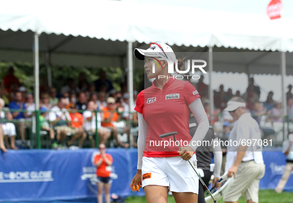 Chella Choi of South Korea acknowledges the gallery after her shot to the 18th green during the final round of the Marathon LPGA Classic gol...
