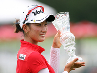 Chella Choi of South Korea holds up the trophy during the award ceremony after winning the tournament in the final round of the Marathon LPG...