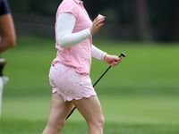 Morgan Pressel of Boca Raton, Florida greets the gallery after making her putt on the 14th green during the second round of the Marathon LPG...