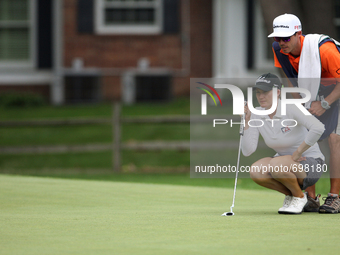Sarah Jane Smith lines up her putt flanked by her husband and caddy, Duane Smith, at the 14th green during the second round of the Marathon...
