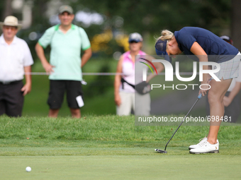 Sarah Kemp of Tuncurry, Australia reacts after missing her putt on the 17th green during the third round of the Marathon LPGA Classic golf t...