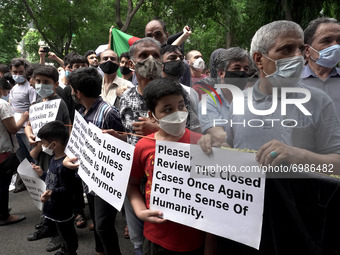 Afghan nationals living in Delhi protest outside the United Nation High Commissioner for Refugees (UNHCR) office appealing international com...