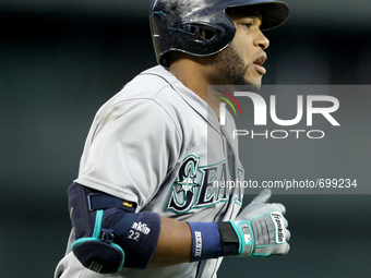 Seattle Mariners' Robinson Cano rounds the bases after his solo home run in the fifth inning of a baseball game against the Detroit Tigers i...