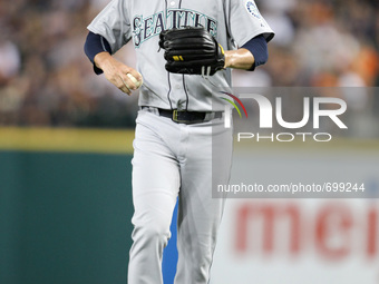 Seattle Mariners relief pitcher Mark Lowe reacts after giving up a two-run home run in the eighth inning of a baseball game against the Detr...