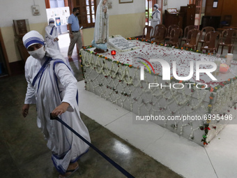 Nuns from Missionaries of Charity attend a special prayer to mark the 111th birth anniversary of Mother Teresa, near her tomb at the Mother...