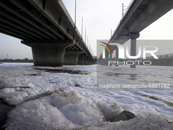 A general view shows the polluted water of Yamuna river covered with toxic foam in New Delhi, India on August 26, 2021. (