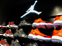 Air Jordan logo is seen in a shoe store in Krakow, Poland on August 26, 2021. (