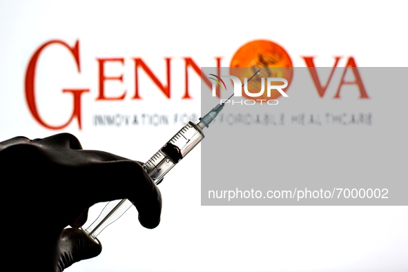 In this photo illustration, a close up of a hand holding a medical syringe in front of the Gennova Biopharmaceuticals Ltd logo 