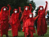 Members of the Extinction Rebellion are seen during the Protest over Assembly Act NRW in Duesseldorf, Germany on August 28, 2021 (