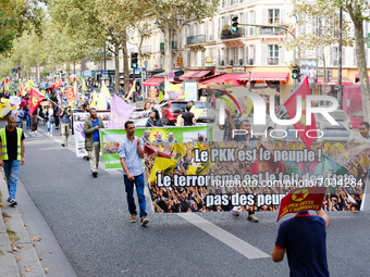 A banner of the Kurdistan Workers' Party in the Kurdish demonstration in Paris, France, on August 28, 2021. As the French and Iraqi presiden...