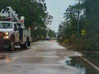 Utility crews work to restore power following Hurricane Ida, Wednesday, September 1, 2021, in Ponchatoula, Louisiana, United States. (