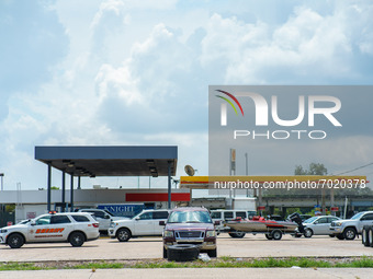 Travelers wait in line for gas following Hurricane Ida, Wednesday, September 1, 2021, in Ponchatoula, Louisiana, United States. (