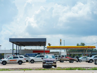 Travelers wait in line for gas following Hurricane Ida, Wednesday, September 1, 2021, in Ponchatoula, Louisiana, United States. (