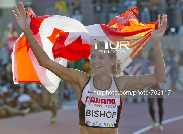 TORONTO, July 23, 2015()-- Melissa Bishop of Canada celebrates after the women's 800m final of the athletics event at the 17th Pan American...