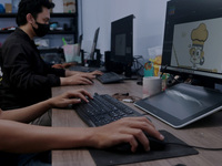 Some workers design an animation ad project at the Animation creative lab, Malang, East Java, on September 2, 2021. 
A start-up company that...