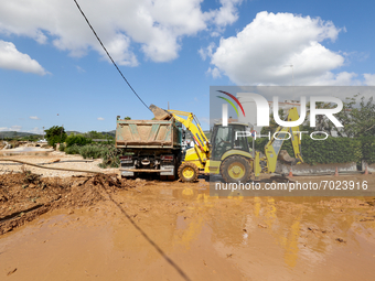 An excavator machine cleaning the street the day after flash floods on September 2, 2021 in Les Cases dAlcanar, Spain.
Torrential rains caus...
