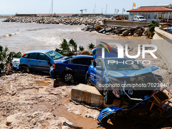 Cars damaged by floods on street filled with mud and derbis the day after flash floods on September 2, 2021 in Les Cases dAlcanar, Spain.
To...