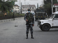 Indian forces stand alert during curfew after Senior Pro-Freedom leader Syed Ali Shah Geelani, 92, passed away at his residence in Srinagar,...
