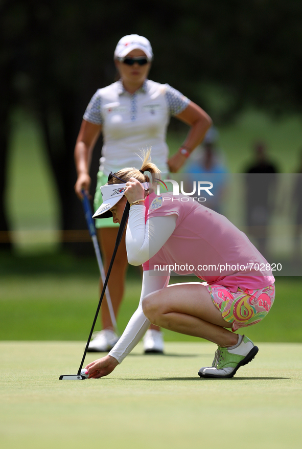 Morgan Pressel of Boca Raton, Florida lines up her putt on the 16th green during the first round of the Meijer LPGA Classic golf tournament...