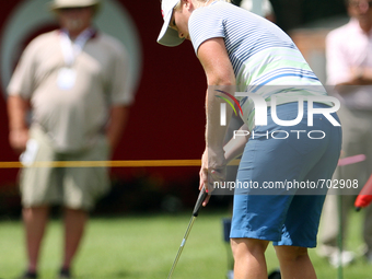 Jacqui Concolino of Orlando, Florida putts on the 10th green during the first round of the Meijer LPGA Classic golf tournament at Blythefiel...