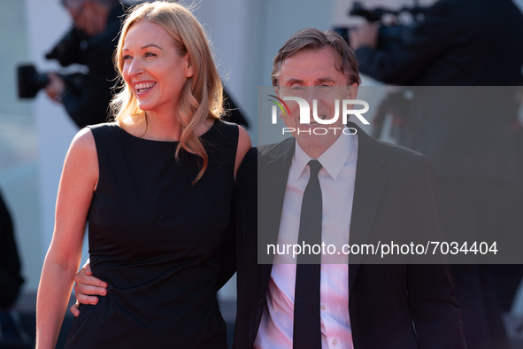 Nikki Butler and Tim Roth arrive on the red carpet ahead of the ''Sundown'' screening during the 78th Venice Film Festival on September 05,...