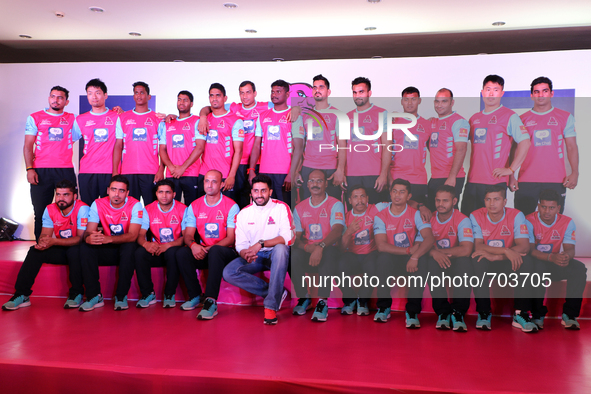 Bollywood actor & Owner of Jaipur Pink Panthers kabaddi team Abhishek Bachchan with his team players  during the press conference ahead the...