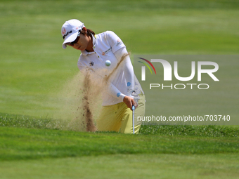 Eun-Hee Ji of South Korea blasts out of the sand trap toward the 10th green during the second round of the Meijer LPGA Classic golf tourname...