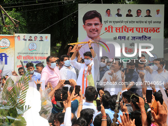 Congress leader and Former State President Sachin Pilot with his supporters during his 44th birthday celebration, outside his residence in J...