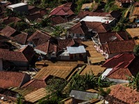 Trays of tobacco leaves are laid out to dry around buildings on 09 September, 2021 in Tobacco Village, Sumedang Regency, Indonesia. The majo...