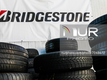 Tyres and Bridgestone logo are seen near the car service in Krakow, Poland on September 9, 2021. (