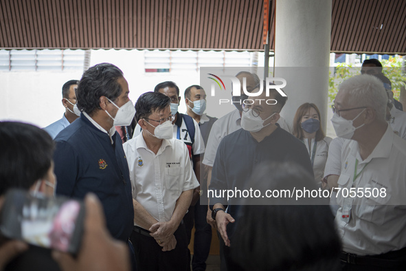 Bukit Mertajam MP Steven Sim (two from right) talks to health minister Khairy Jamaluddin during Khairy official working visits at Penang Hos...