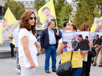 Kurdish demonstrators carry placards with quotes from Abdullah Öcalan written on them. In Paris, France, on September 11, 2021 as in many ci...