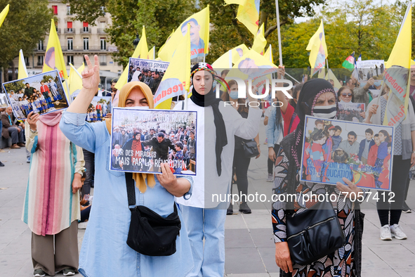 Kurdish demonstrators carry placards with quotes from Abdullah Öcalan written on them. In Paris, France, on September 11, 2021 as in many ci...